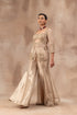 Beige gold silk bustier set with flare tissue flare panel pants and organza jacket